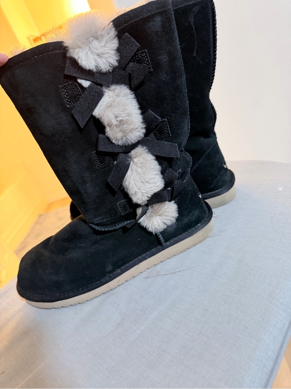 Koolaburra Black Suede Ankle Boots with Cream Fur Pom Accents